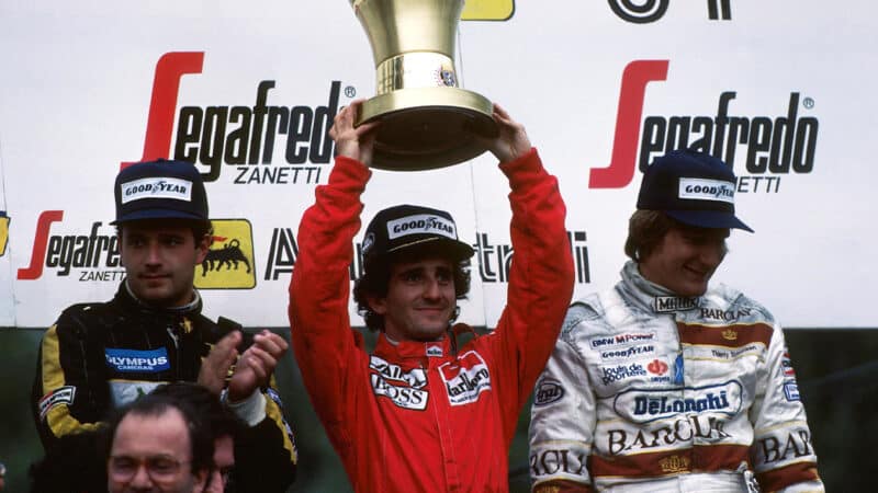 Alain Prost on Imola podium with Elio de Angelis and Thierry Boutsen after the 1985 San Marino Grand Prix