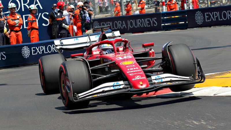 Charles Leclerc bounces over Monaco kerb during qualifying for the 2025 F1 Grand Prix