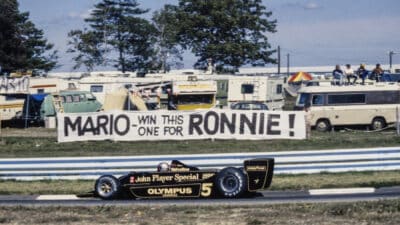 Mario Andretti, Lotus 79 Ford drives past a banner from a fan. Ronnie Peterson had died at the recent Italian Grand Prix at Monza during the United States GP at Watkins Glen International on October 01, 1978