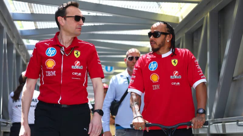 Lewis Hamilton talks with Riccardo Adami