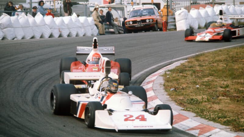 James Hunt, Hesketh 308B Ford leads Niki Lauda, Ferrari 312T and Jochen Mass, McLaren M23 Ford during the Dutch GP at Zandvoort