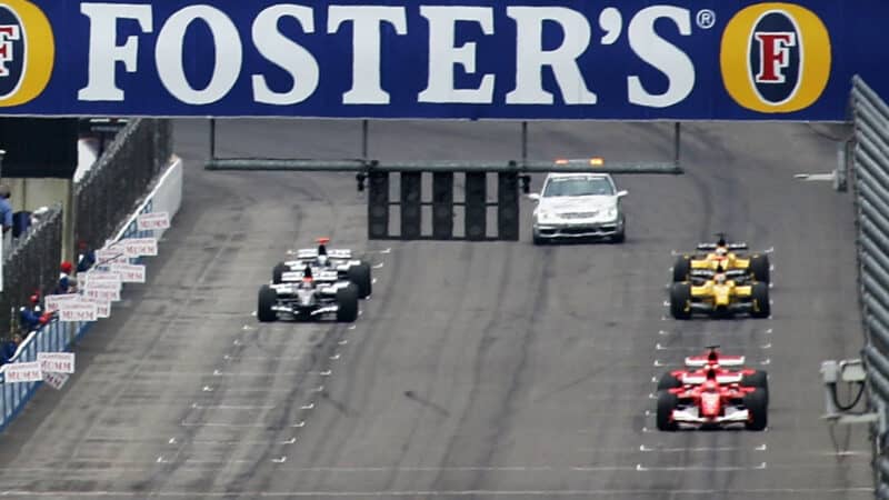 Six F1 cars on the grid at the 2005 United States Grand Prix