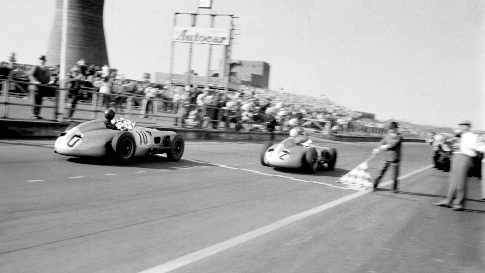 Stirling Moss and Juan Manuel Fangio at Aintree 1955