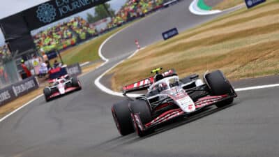 Haas-Ferrari drivers Oliver Bearman and Esteban Ocon enter the pits during practice for the 2025 British Grand Prix