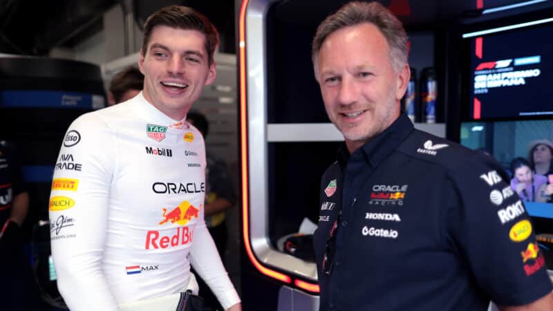 Christian Horner with Max Verstappen in Red Bull F1 pit garage