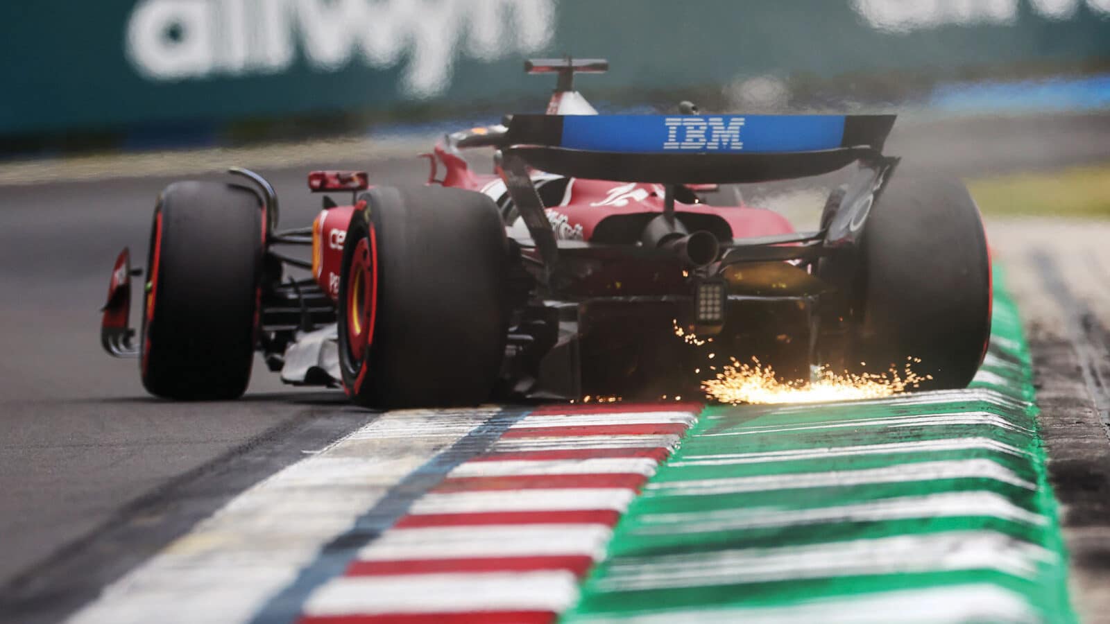 Ferrari sparks from Leclerc’s car