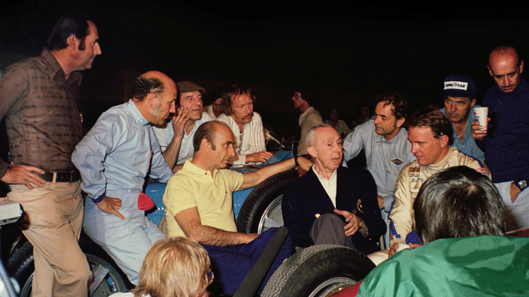 Some of the finest F1 names flocked to California in 1976. From left: Jack Brabham, Stirling Moss, Innes Ireland, Juan Manuel Fangio, Richie Ginther, René Dreyfus, Phil Hill, Dan Gurney, Carroll Shelby and Maurice Trintignant