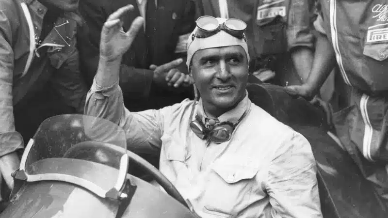 26th August 1950- Italian racing driver Giuseppe Farina acknowledges the cheers of the spectators from his Alfa-Romeo after winning the International Trophy Race at Silverstone. (Photo by Keystone:Getty Images)