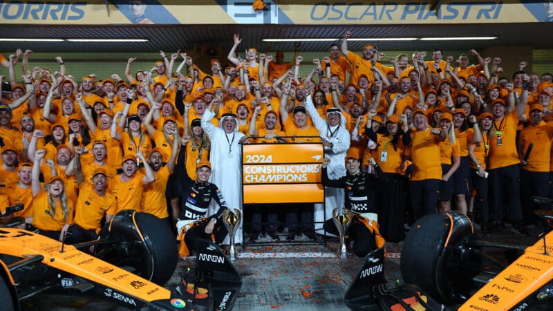 Lando Norris and Oscar Piastri celebrate winning 2024 constructors championship at the 2025 Abu Dhabi Grand Prix