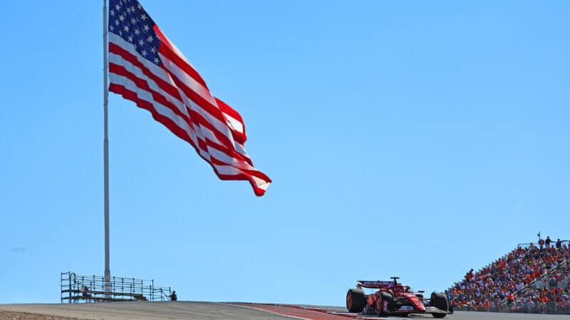 American flag / stars and stripes and Charles Leclerc (Ferrari) during the 2024 United States Grand Prix