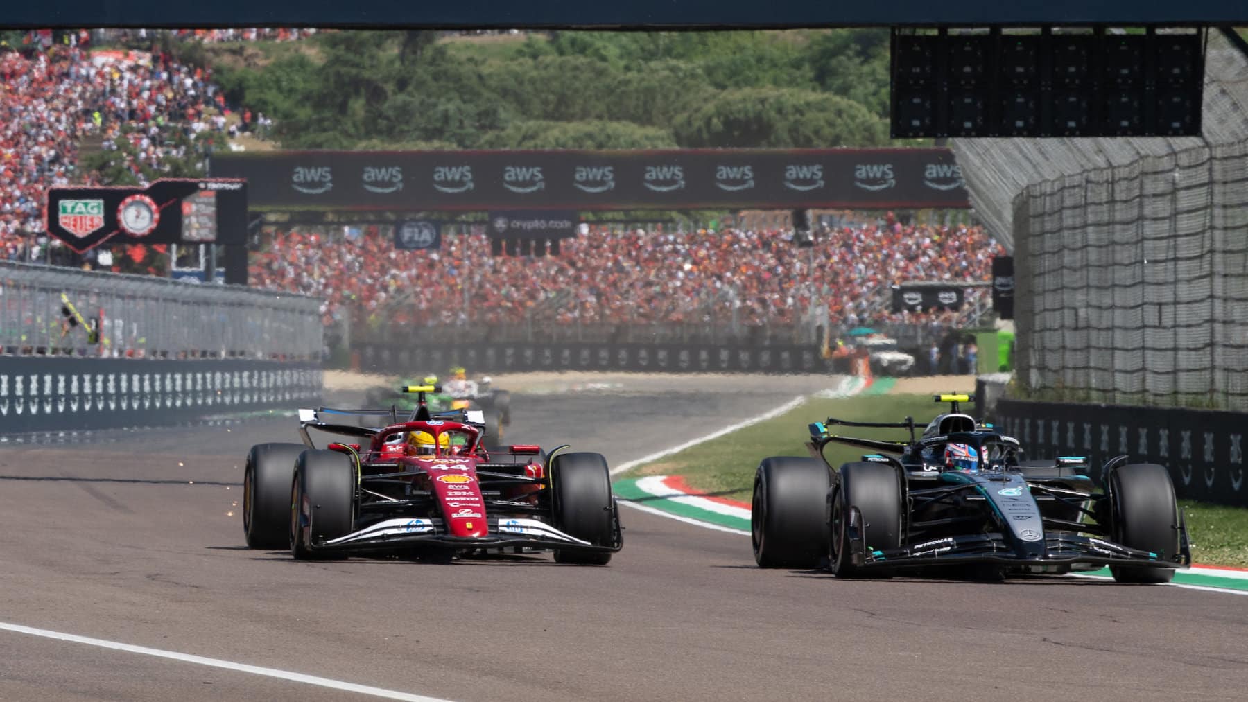 Lewis Hamilton (Ferrari) and Kimi Antonelli (Mercedes) during the 2025 Emilia Romagna Grand Prix