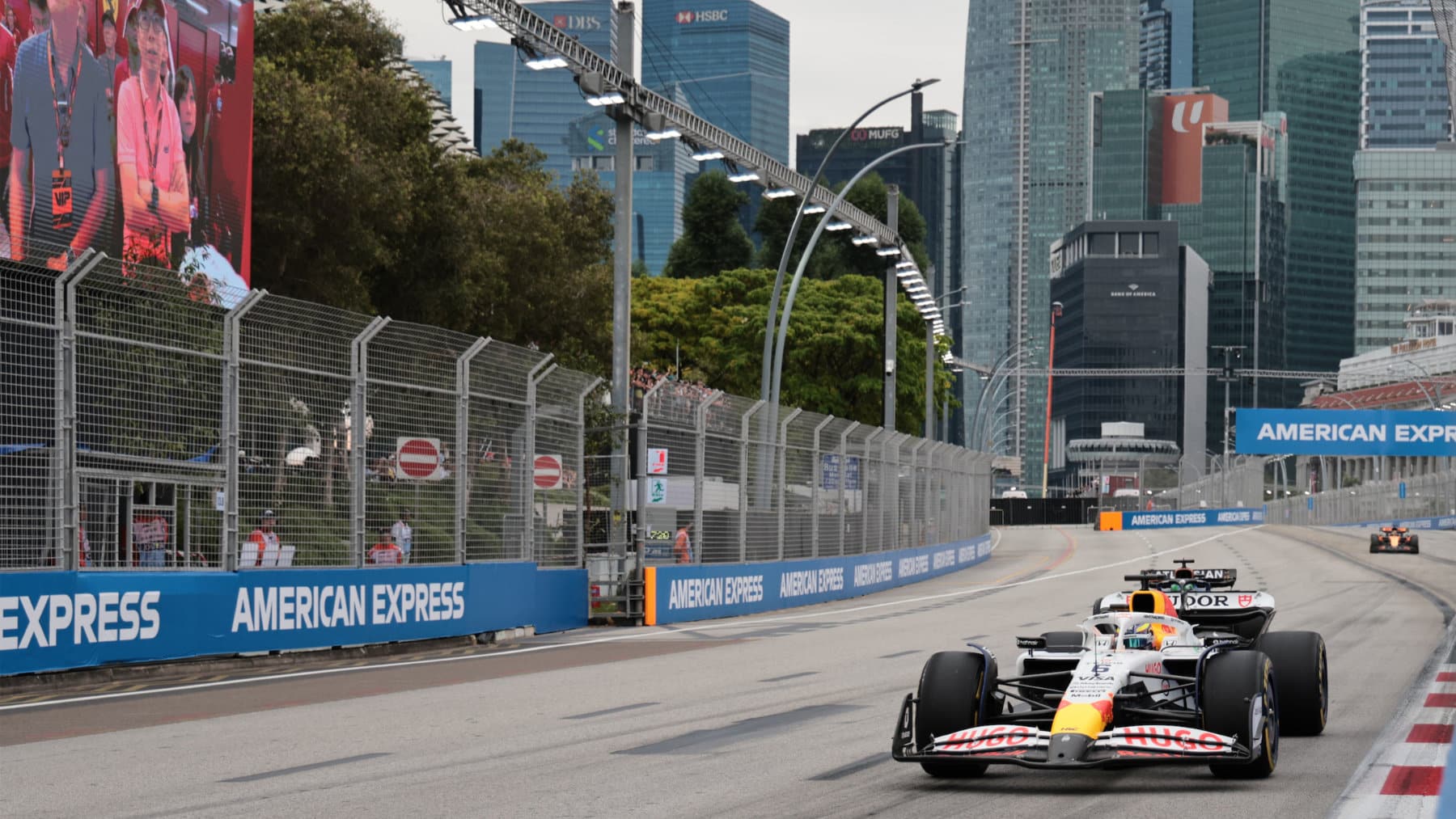 Isack Hadjar (Racing Bull-Honda) leads Alexander Albon (Williams-Mercedes) during practice for the 2025 Singapore Grand Prix