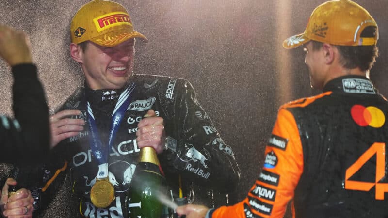 Max Verstappen and Lando Norris spray champagne after 2025 F1 Las Vegas Grand Prix
