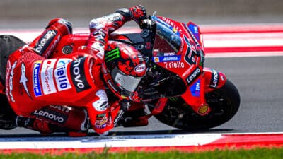 Pecco Bagnaia cornering on Ducati in 2025 MotoGP race