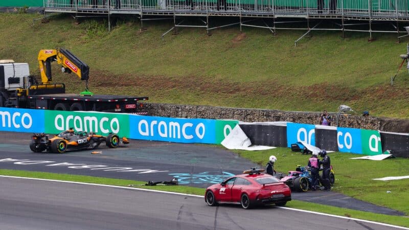 Stranded McLaren of Oscar Piastri next to Franco Colapinto and crashed Alpine in 2025 F1 Sao Paulo sprint race