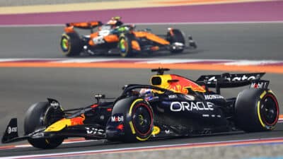 Max Verstappen (Red Bull-Honda) leads Lando Norris (McLaren-Mercedes) during the 2025 Qatar Grand Prix