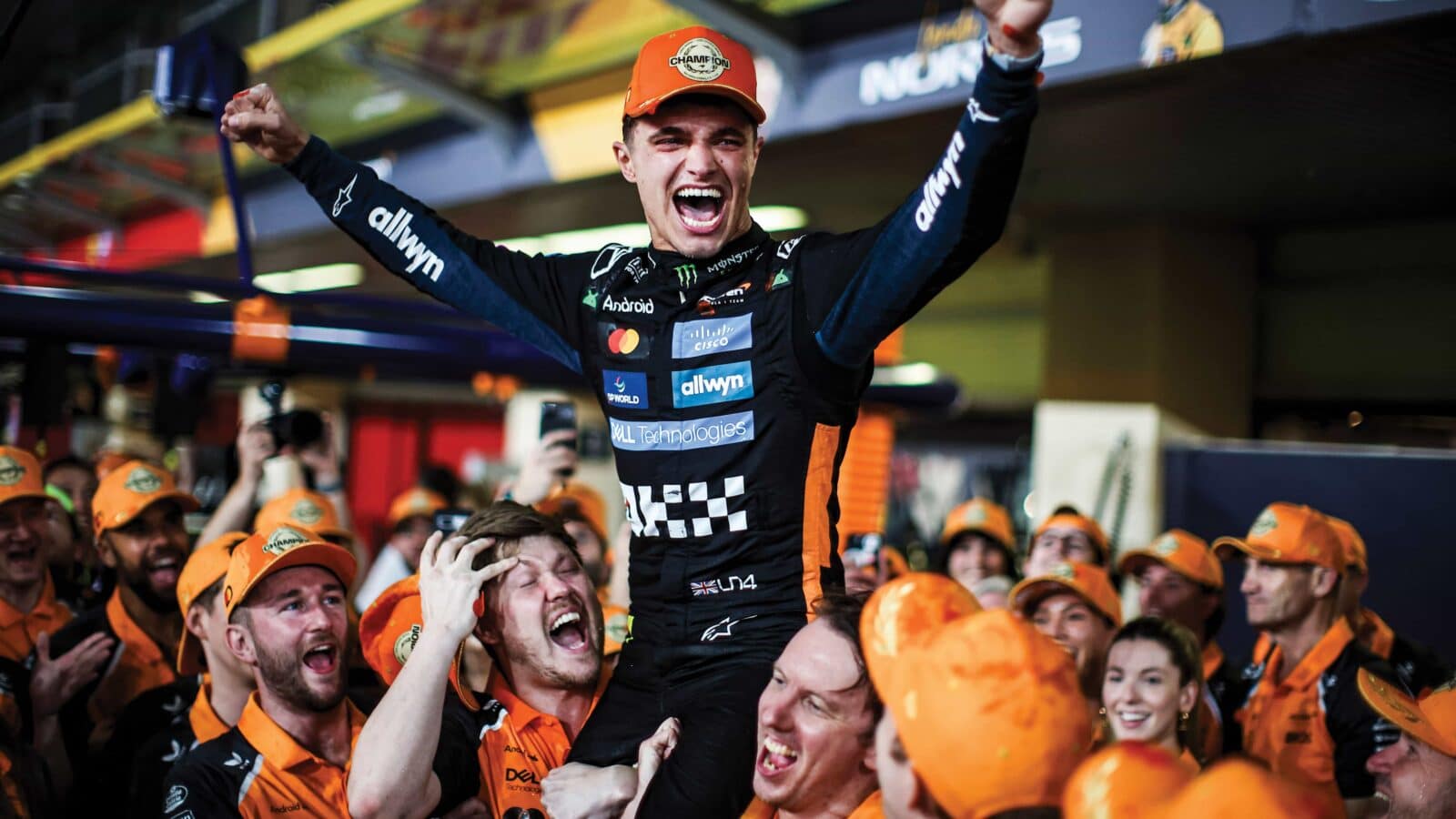 Lando Norris celebrates championship