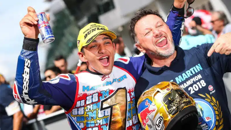 Fausto Gresini celebrates winning the 2018 Moto3 world title with Jorge Martin. Team founder Gresini had a little less than two more years to live